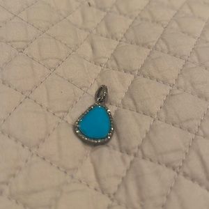 Turquoise and Diamond pendant over silver